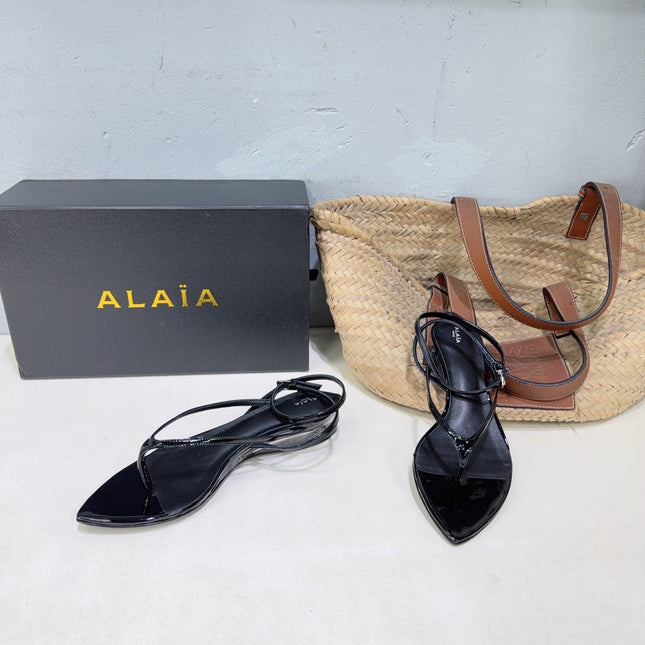 ALAIA 26S THONG SANDALS IN BLACK CALFSKIN