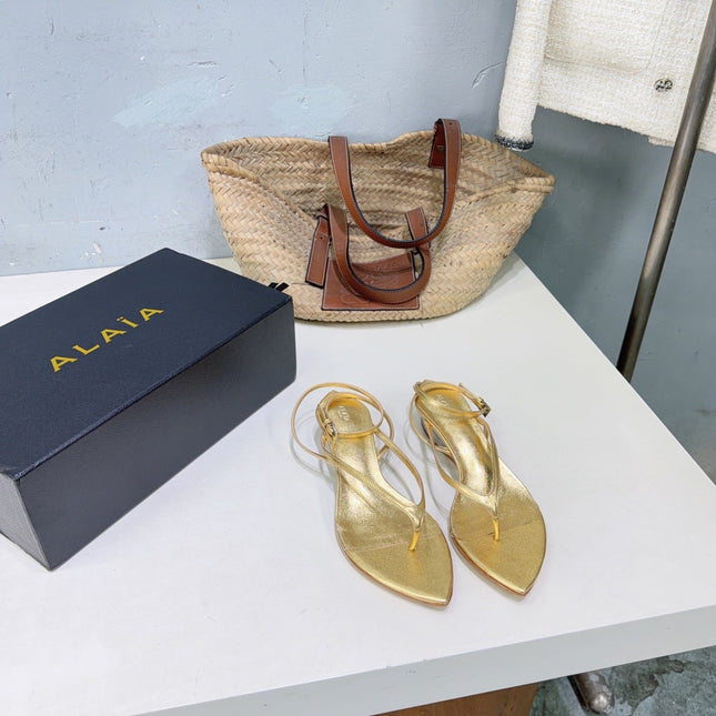 ALAIA 26S THONG SANDALS IN GOLD CALFSKIN