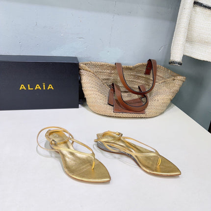 ALAIA 26S THONG SANDALS IN GOLD CALFSKIN