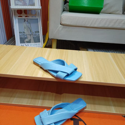 BOTTEGA VENETA 26S FLAT SLIDES IN SKY BLUE LAMBSKIN