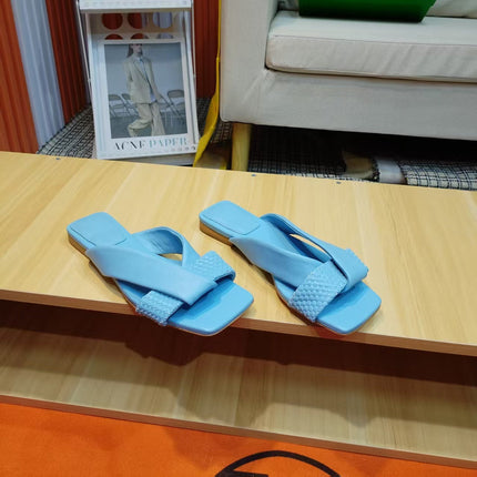 BOTTEGA VENETA 26S FLAT SLIDES IN SKY BLUE LAMBSKIN