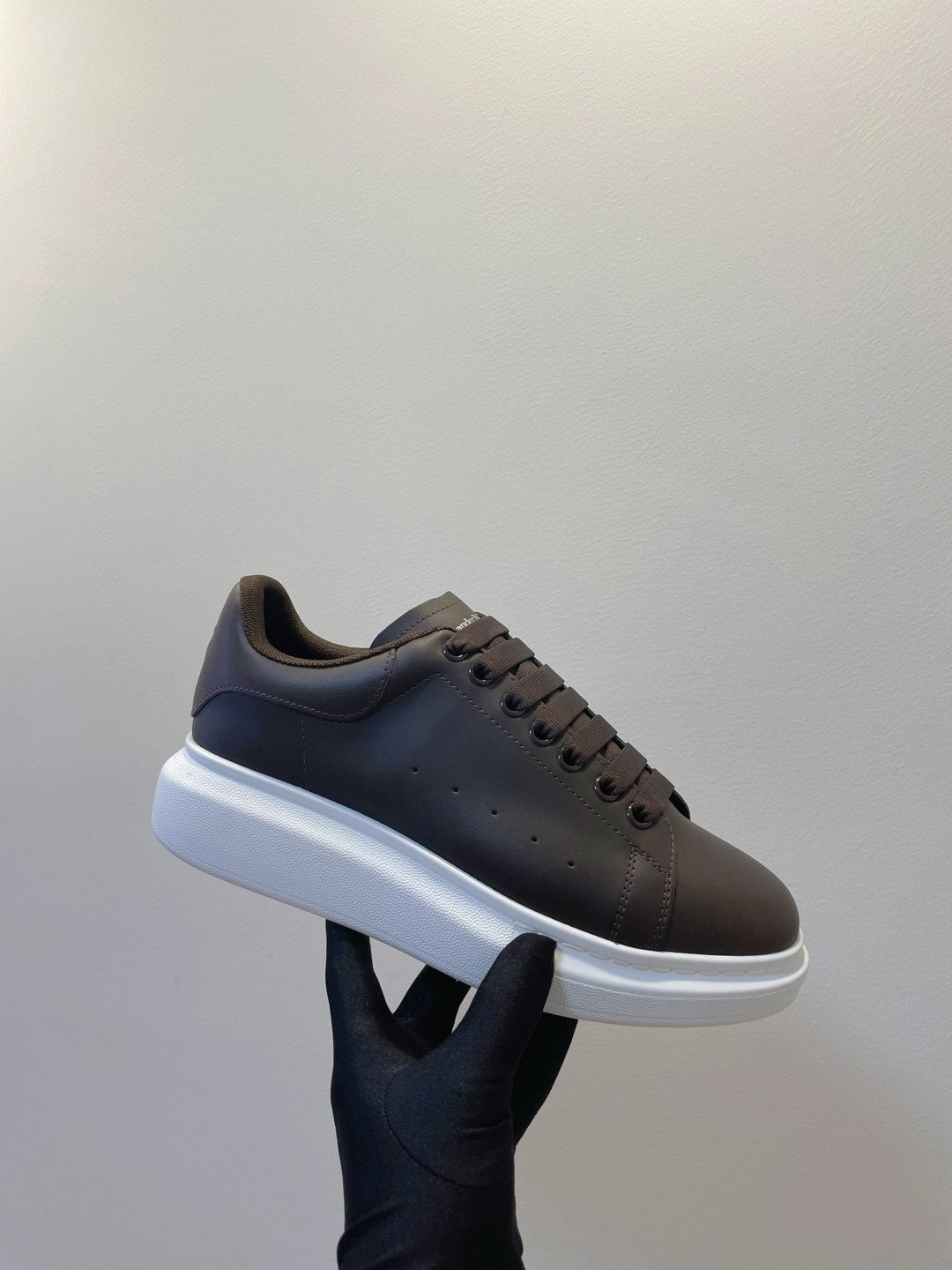 OVERSIZED SNEAKERS IN DARK BROWN SMOOTH CALFSKIN