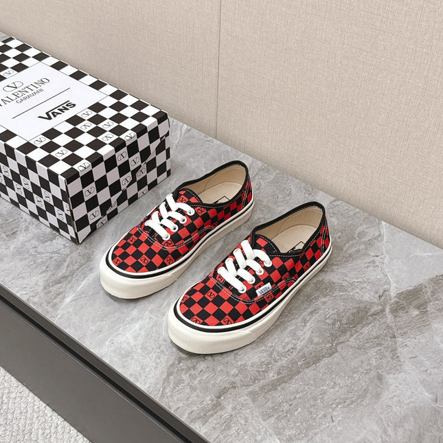 VALENTINO 25S GARAVANI X VANS SNEAKERS IN RED MIX BLACK CANVAS