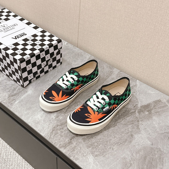 VALENTINO 25S GARAVANI X VANS SNEAKERS IN GREEN MIX BLACK CANVAS
