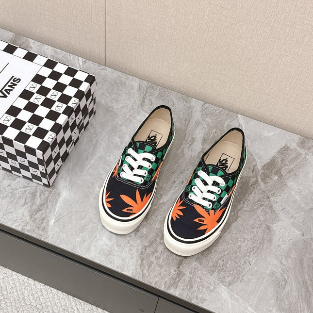 VALENTINO 25S GARAVANI X VANS SNEAKERS IN GREEN MIX BLACK CANVAS