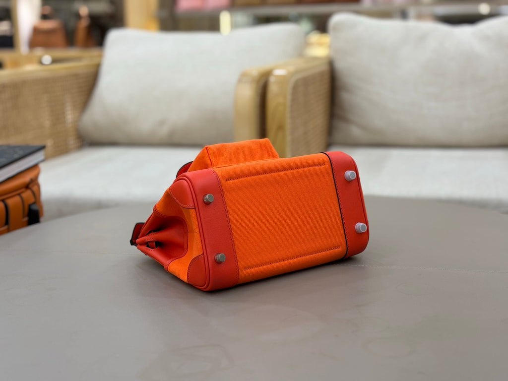HM 25S BIRKIN CARGO 25 CM IN DARK ORANGE CANVAS AND SWIFT WITH SILVER HARDWARE