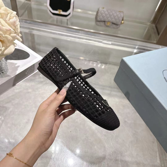 PRADA 26S LOGO PLAQUE MARY JANE FLATS IN BLACK WOVEN FIBER