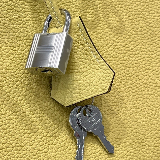 HM 25S BIRKIN 25 CM IN YELLOW TOGO WITH KEY SILVER