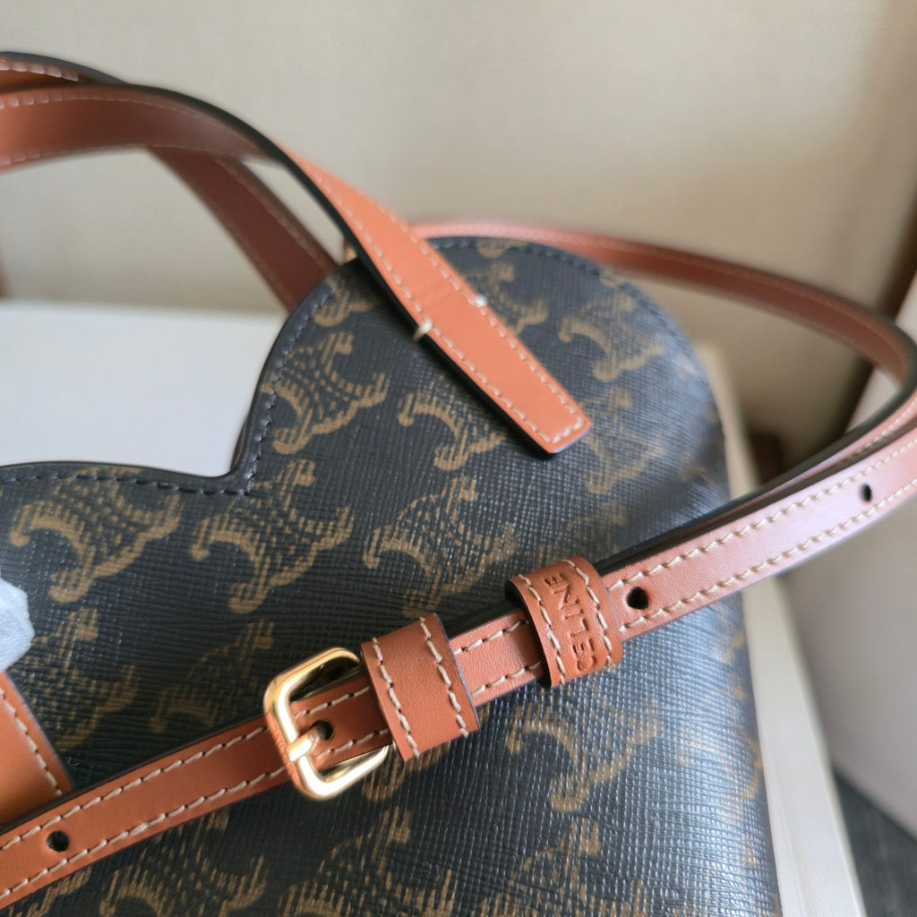 CELINE 25S TEEN COEUR BAG 19 MM IN BLACK TRIOMPHE CANVAS AND TAN CALFSKIN