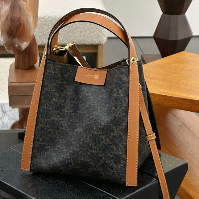 CELINE 25S SMALL CUBE BAG 21MM IN BLACK TRIOMPHE CANVAS AND BORWN CALFSKIN