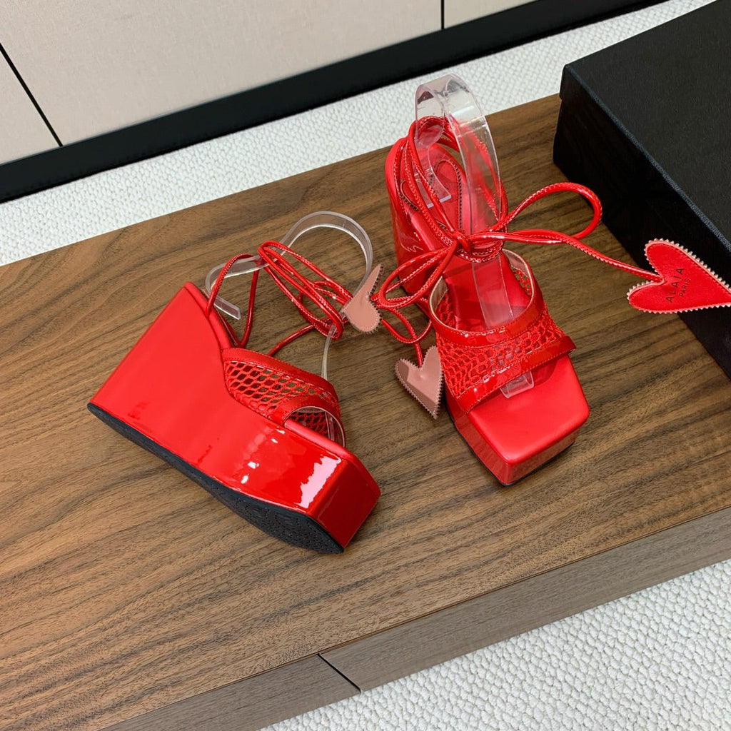 ALAIA BANQUET WEDGE SANDALS IN CHERRY RED LAMBSKIN WITH RED HEART