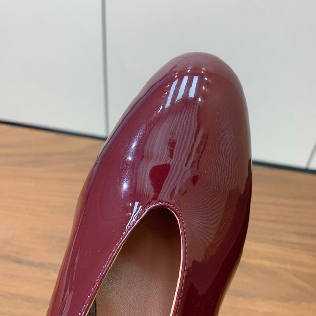 ALAIA 26S WEDGE MULES 70 MM IN DARK RED GLOSSY CALFSKIN