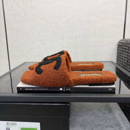 CHANEL 26S SLIDE SANDALS IN ORANGE BROWN AND BLACK SHEARLING SQUARE TOE