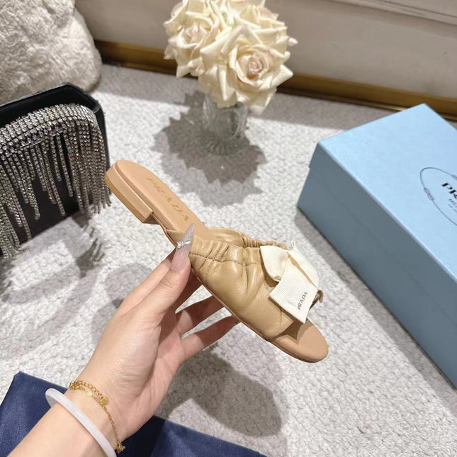 PRADA 26S RUCHED BOW SLIDE SANDALS IN BEIGE CALFSKIN