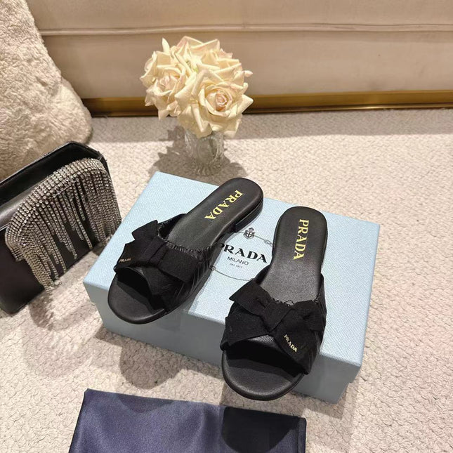 PRADA 26S RUCHED BOW SLIDE SANDALS IN BLACK CALFSKIN