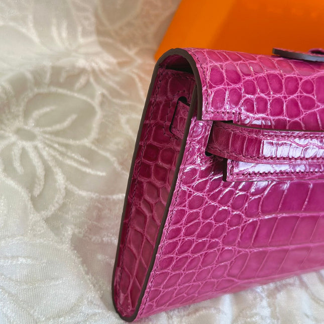 KELLY CUT 31 IN MAGENTA PURPLE SHINNY ALLIGATOR LEATHER WITH SILVER HARDWARE