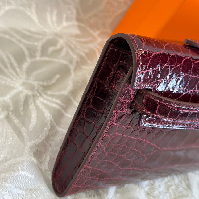 KELLY CUT 31 IN SANGRIA PURPLE SHINNY ALLIGATOR LEATHER WITH SILVER HARDWARE
