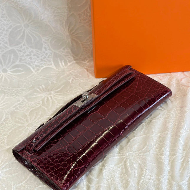 KELLY CUT 31 IN SANGRIA PURPLE SHINNY ALLIGATOR LEATHER WITH SILVER HARDWARE