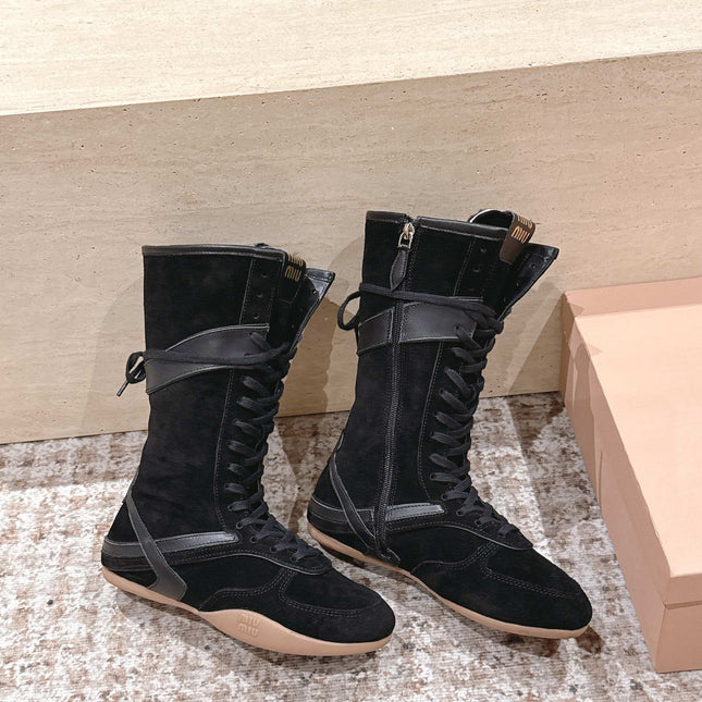 MIUMIU 25S ANKLE BOOTS IN BLACK SUEDE WITH SHEARLING