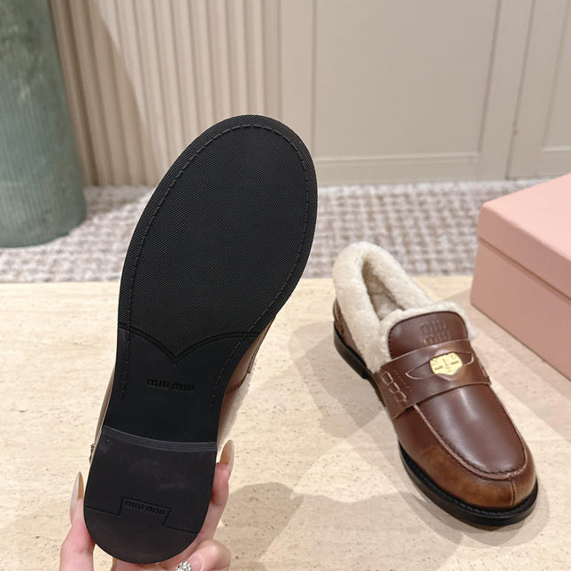 MIUMIU 25S PENNY LOAFERS 20MM IN EBONY BROWN BLEACHED CALFSKIN WITH SHEARLING