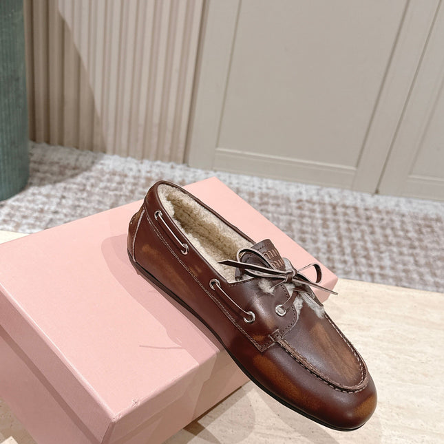 MIUMIU 25S BOAT SHOES IN SIENNA BROWN BLEACHED CALFSKIN WITH SHEARLING
