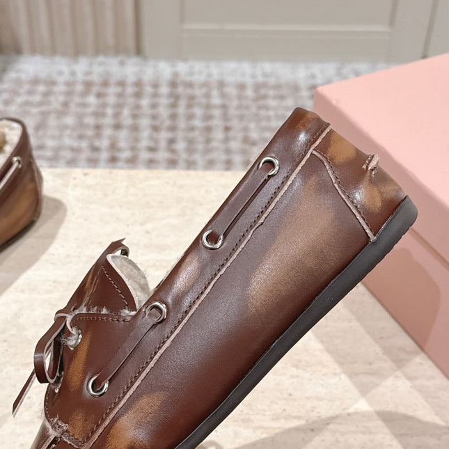 MIUMIU 25S BOAT SHOES IN SIENNA BROWN BLEACHED CALFSKIN WITH SHEARLING