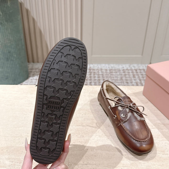 MIUMIU 25S BOAT SHOES IN SIENNA BROWN BLEACHED CALFSKIN WITH SHEARLING