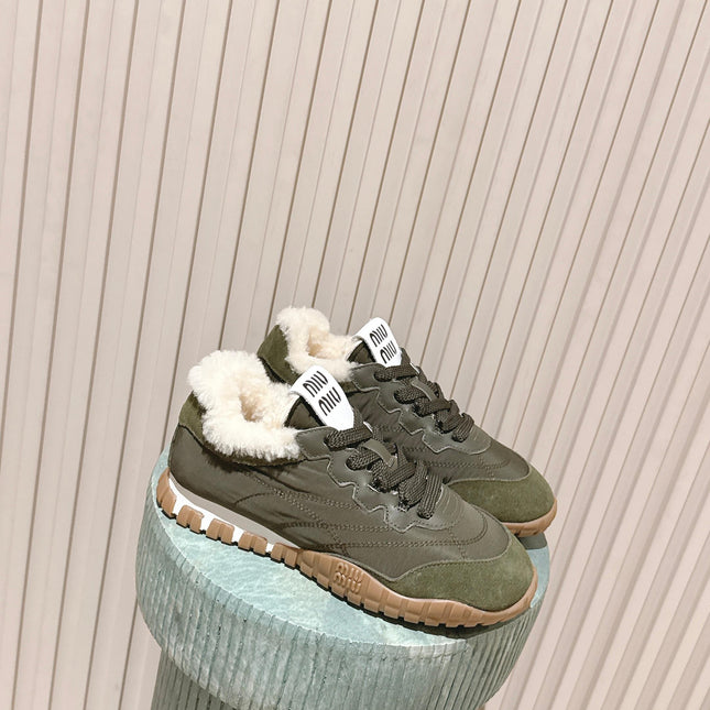 MIUMIU 25S SNEAKERS IN LODEN GREEN TYRE TECHNICAL FABRIC AND SUEDE SHEARLING
