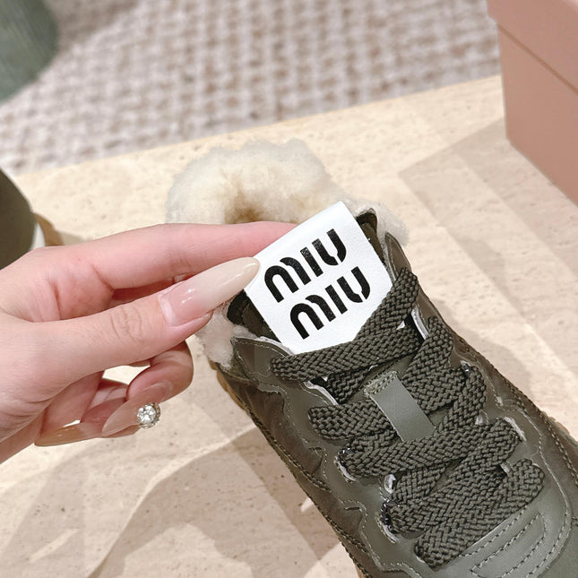 MIUMIU 25S SNEAKERS IN LODEN GREEN TYRE TECHNICAL FABRIC AND SUEDE SHEARLING