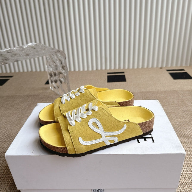 LOEWE 26S LACE-UP FLAT SLIDES IN YELLOW SUEDE
