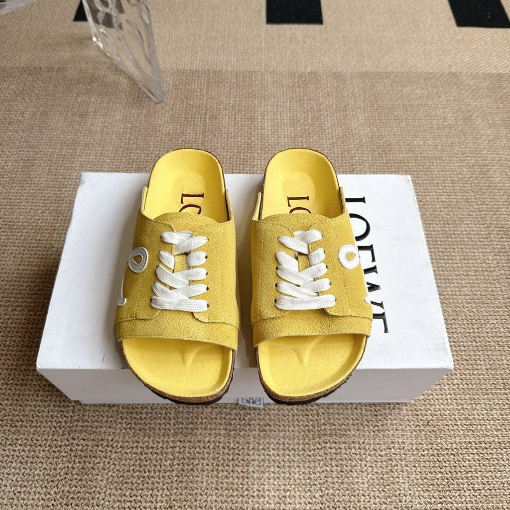LOEWE 26S LACE-UP FLAT SLIDES IN YELLOW SUEDE