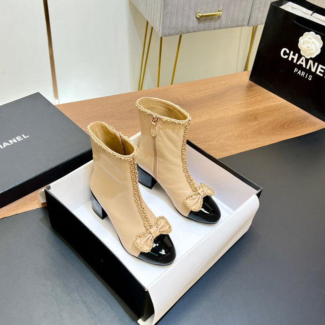 CHANEL 25S HEELED CHAIN BOOTS WITH BOW IN BEIGE CALFSKIN GOLD HARDWARE