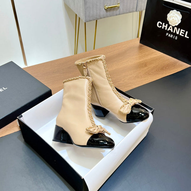 CHANEL 25S HEELED CHAIN BOOTS WITH BOW IN BEIGE CALFSKIN GOLD HARDWARE