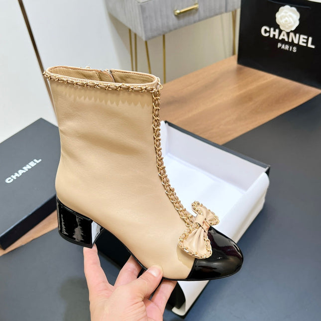 CHANEL 25S HEELED CHAIN BOOTS WITH BOW IN BEIGE CALFSKIN GOLD HARDWARE