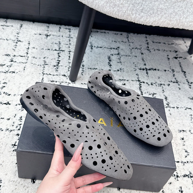 ALAIA 26S FLAT SLIP-ONS IN GREY SUEDE WITH OPENWORK PATTERN
