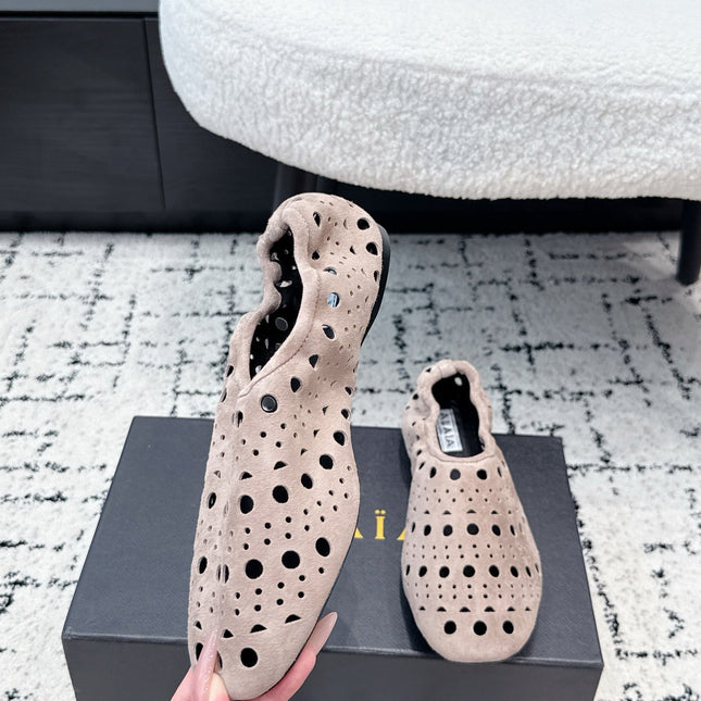 ALAIA 26S FLAT SLIP-ONS IN NUDE PINK SUEDE WITH OPENWORK PATTERN