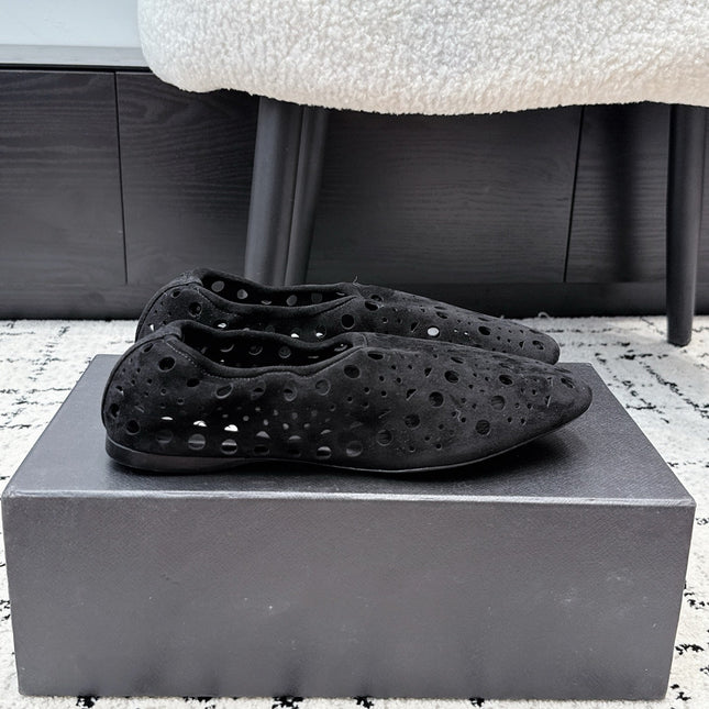 ALAIA 26S FLAT SLIP-ONS IN BLACK SUEDE WITH OPENWORK PATTERN