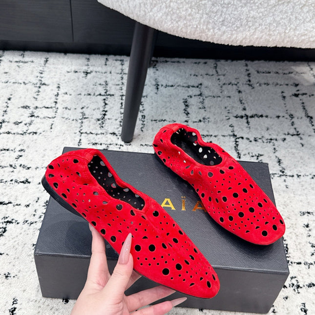 ALAIA 26S FLAT SLIP-ONS IN RED SUEDE WITH OPENWORK PATTERN