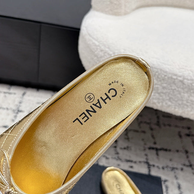 CHANEL 26S FLAT MULES IN GOLD LAMBSKIN