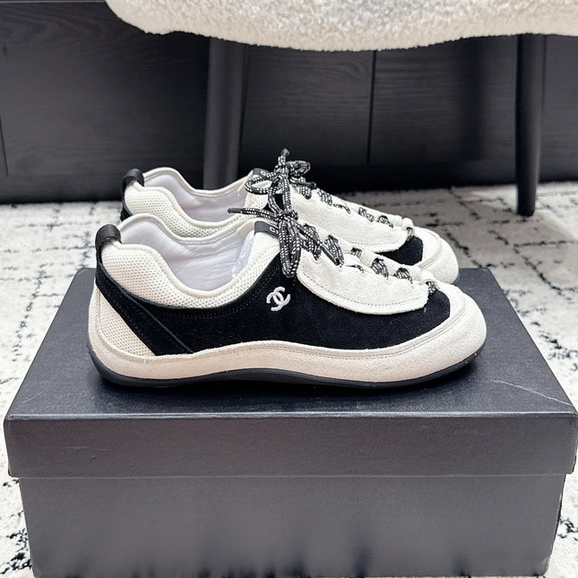 CHANEL 26S LACE-UP SNEAKERS IN WHITE AND BLACK SUEDE STYLE 2