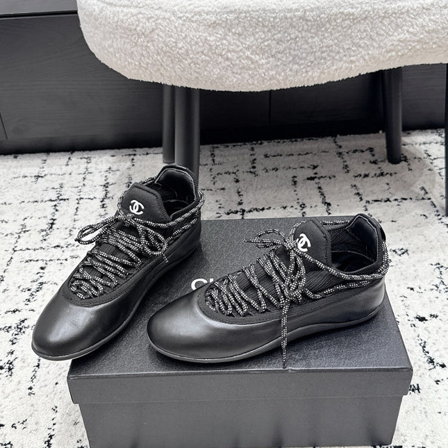 CHANEL 26S LACE-UP SNEAKERS IN BLACK FABRIC AND LAMBSKIN