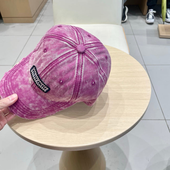 MIUMIU DISTRESSED FABRIC BASEBALL CAP IN PINK WITH EMBROIDERED LOGO