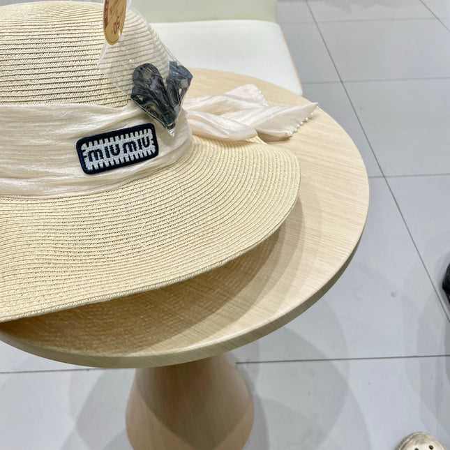 MIUMIU WIDE-BRIM BEACH HAT IN LIGHT BEIGE WITH FABRIC BOW