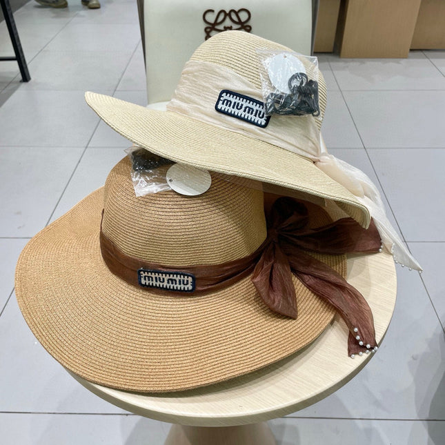MIUMIU WIDE-BRIM BEACH HAT IN LIGHT BEIGE WITH FABRIC BOW