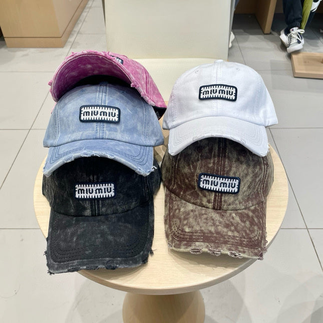 MIUMIU DISTRESSED FABRIC BASEBALL CAP IN PINK WITH EMBROIDERED LOGO