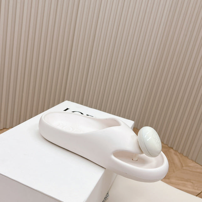 LOEWE 26S PEBBLE TOE-POST SLIDES IN WHITE EVA