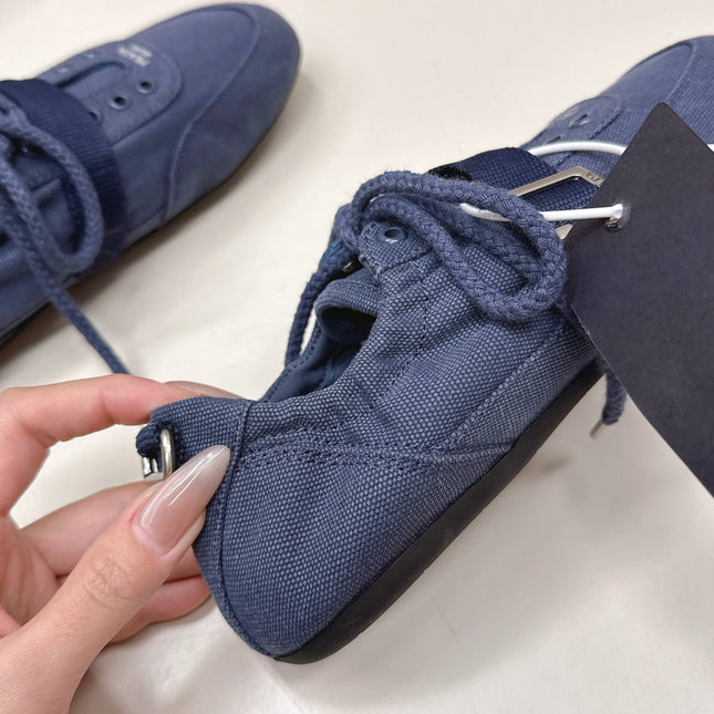 PRADA 26S LACE UP MINIMAL SNEAKERS IN NAVY BLUE CANVAS