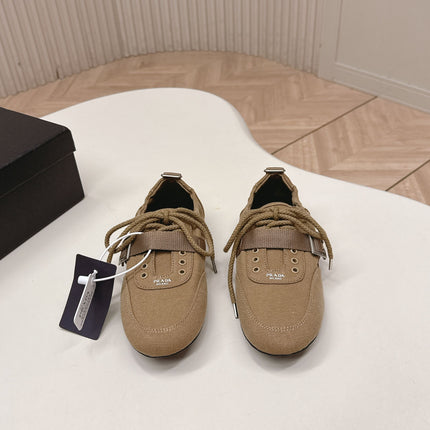 PRADA 26S LACE UP MINIMAL SNEAKERS IN BROWN CANVAS