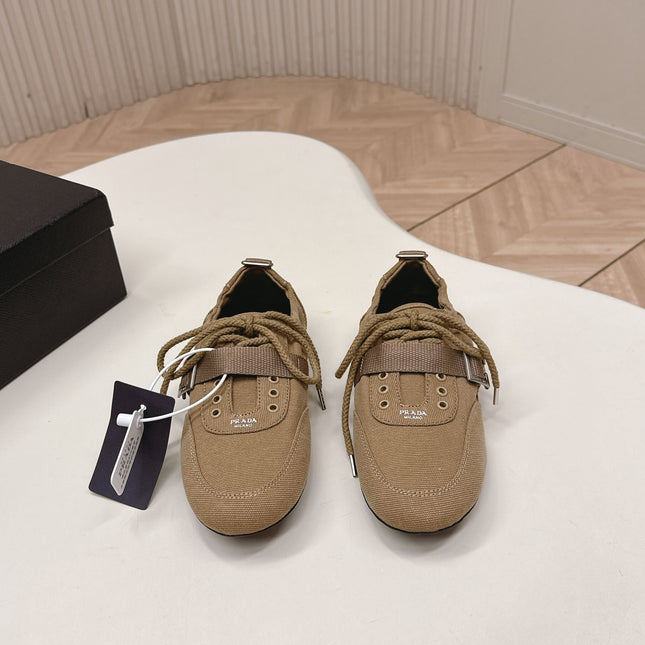 PRADA 26S LACE UP MINIMAL SNEAKERS IN BROWN CANVAS