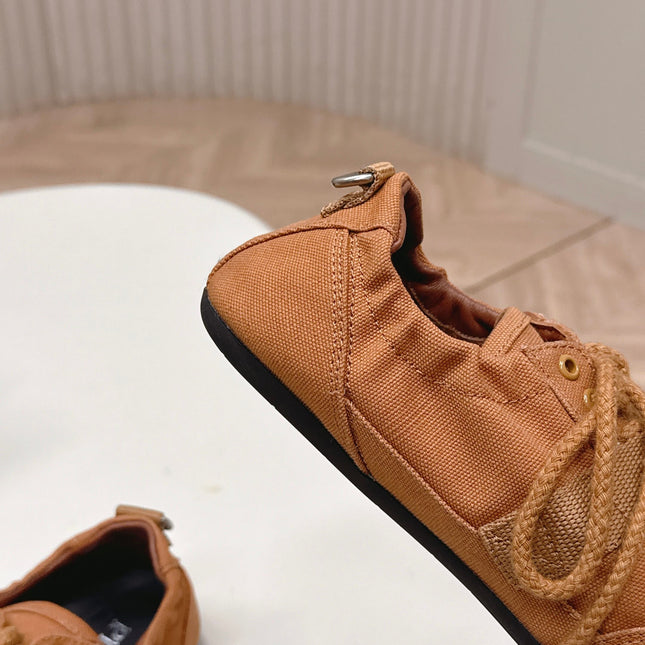 PRADA 26S LACE UP MINIMAL SNEAKERS IN CARAMEL BROWN CANVAS